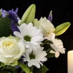 Funeral flow arrangement with candle