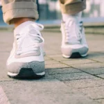 Person walking on pavement